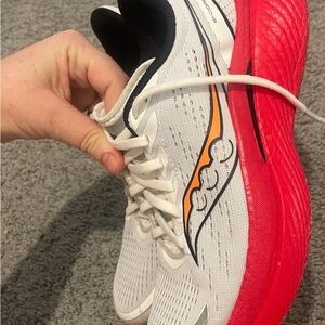 Saucony Red and White Athletic Sneakers